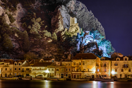 Night cityscape of town of Omis, Croatia. Omis is town on the Adriatic Sea in Croatia. Night...