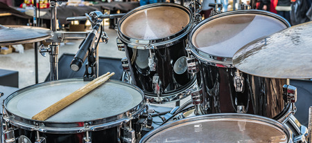 Photography is taken on small local stage few minutes before concert of rock group in Ston, Croatia.