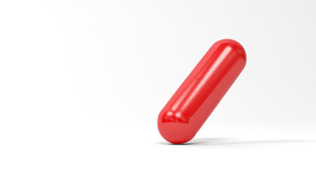 Red pill isolated on white background. 3d illustration.の写真素材