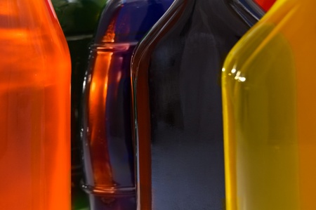 Glass bottles with different colored liquids.の写真素材