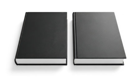 Two books isolated on white backgroundの素材