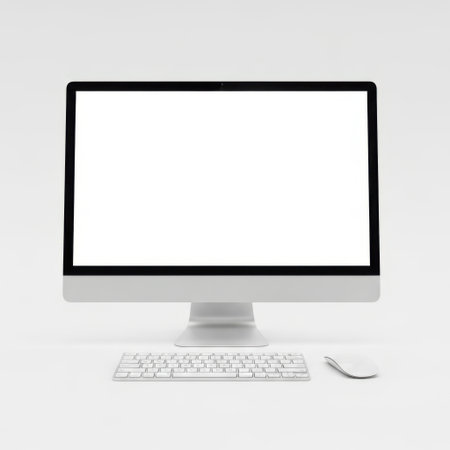 Modern computer monitor with keyboard and mouse isolated on white backgroundの素材