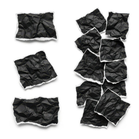 Crumbled paper pieces isolated on white backgroundの素材