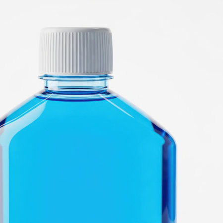 Blue bottle with white cap isolated on white backgroundの素材