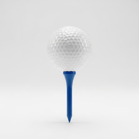 Golf ball on tee isolated on white backgroundの素材