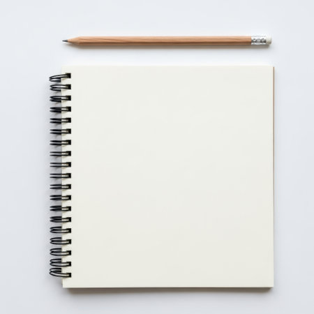 Notebook and pencil isolated on white backgroundの素材