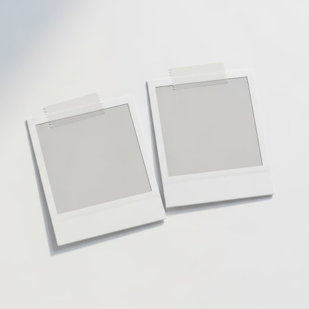 Two polaroid photos isolated on white backgroundの素材