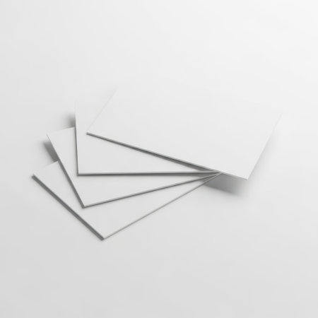 Stack of white cards isolated on white backgroundの素材
