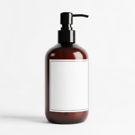 Brown liquid soap dispenser isolated on white backgroundの素材