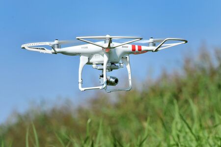 While hovering drones