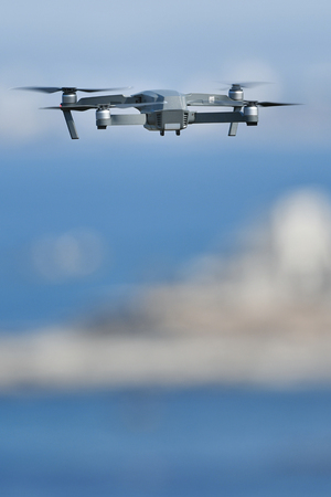 Drone flies over the sea
