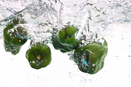 Bell peppers underwaterの写真素材