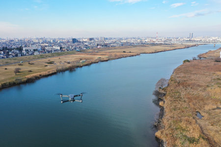 A small drone flying over the Edo Riverの写真素材