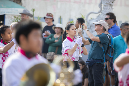 CHIANGMAI , THAILAND - FEB 2 2019: Young men and young women in costume taking part in an annual flower festival, 43 th Anniversary Chiang Mai Flower Festival 2019.のeditorial素材