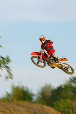 CHIANGMAI, THAILAND - JUN 17 2020 : Unknown Motorcycle driver piloting his Motocross Rehearse on the tracks in Chiang Mai, Thailand.のeditorial素材