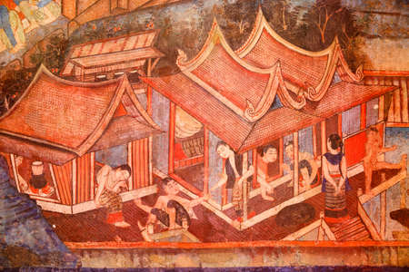 Wall Ancient painting of buddhist temple mural at Wat Phra sing, a famous temple in chiangmai province, Thailand. The temple is open to the public and has beautiful murals on the walls.のeditorial素材