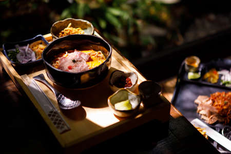Curried Noodle Soup (Khao soi) with thai style spice, Northern Thai style cuisine.の写真素材