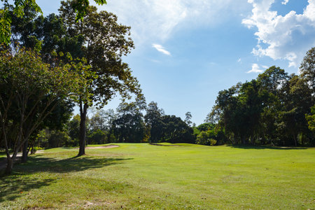 Golf course with blue sky backgroundの写真素材