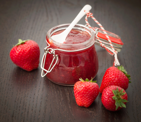 Strawberry jam and fresh berriesの写真素材