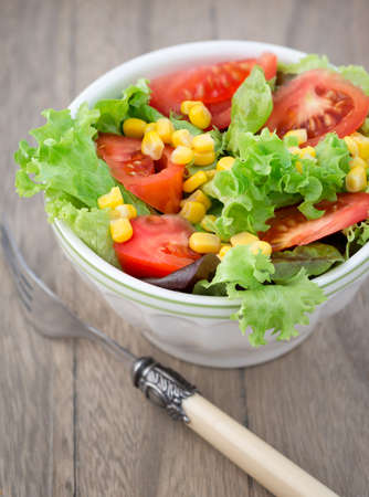 Fresh mixed salad with tomatoes, cornの写真素材