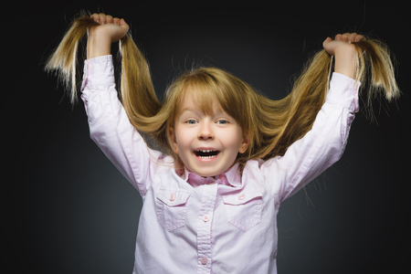 Closeup portrait successful happy girl isolated grey background. Positive human emotion face expression. Life perception achievement vision.の写真素材