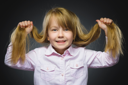 Closeup portrait successful happy girl isolated grey background. Positive human emotion face expression. Life perception achievement vision.の写真素材