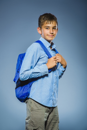 school concept. Closeup portrait successful happy boy with knapsack.の写真素材