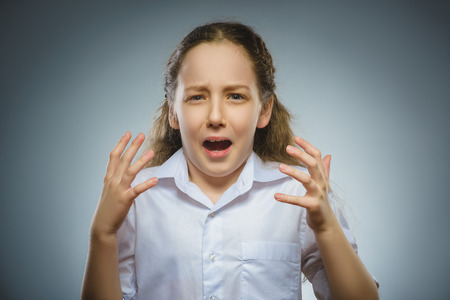 Closeup sad girl with worried stressed face expressionの写真素材