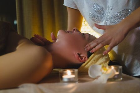 picture of calm beautiful woman in massage salonの写真素材