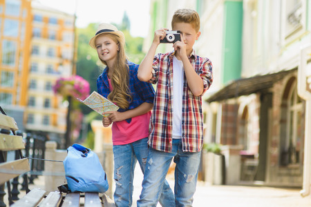 group of children travel in Europe. Tourism and Vacation conceptの写真素材