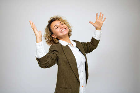 Beautiful woman in a jacket, smile, happy, cheerful, laughing, emotion of happiness, in full growth,...