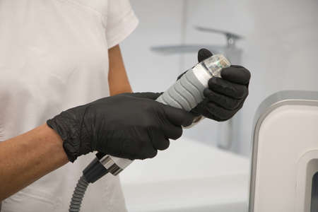 Apparatus for facial skin rejuvenation by electric radio waves.