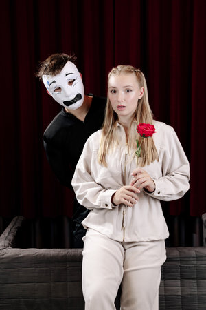 A pantomime scene between two actors expressing the emotion of fear. Close-up.の写真素材