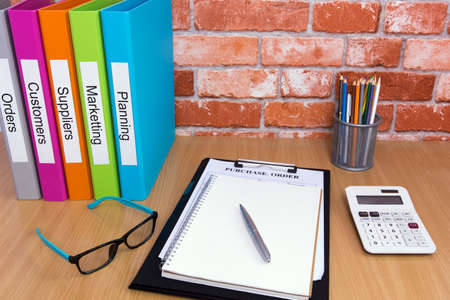 Office desk with fileの写真素材