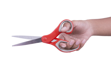 Hand hold scissors on white backgroundの写真素材