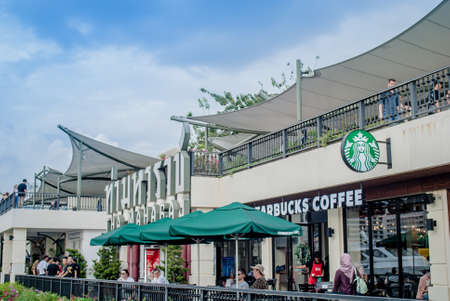 Bangkok, THAILAND - NOVEMBER 10, 2018: Starbuck coffee at Tha maharaj Beside Chao Phraya River