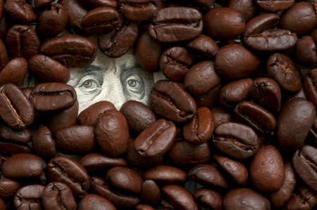 Coffee beans on one hundred dollarsの写真素材