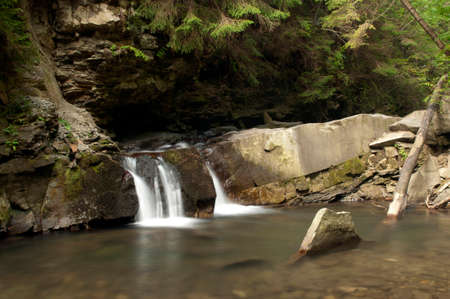 Small waterfall Divochi Sliozy on the Zhonka river in Yaremche, Ivano-Frankivsk region, Ukraineの写真素材