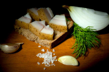 Sandwich with salted served with garlic, onion and dillの写真素材