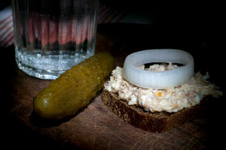 Forshmak (minced herring) on rye bread, light brushの写真素材