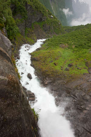 Fantastic creature of nature - scandinavian waterfall in Norwayの写真素材