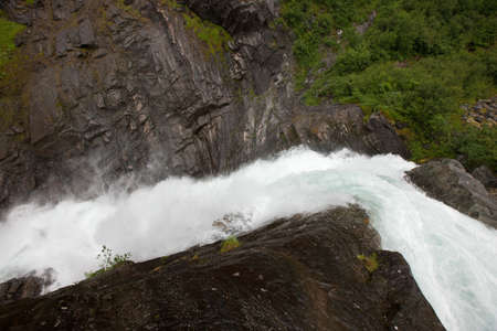 Fantastic creature of nature - scandinavian waterfall in Norwayの写真素材