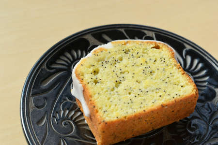 A piece of Poppy Seed Cake on Yachimun (traditional pottery in Okinawa, Japan)