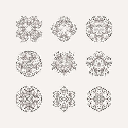 Set of ornate vector mandala symbols. Mehndi lace tattoo. Oriental weave. The circular pattern.のイラスト素材