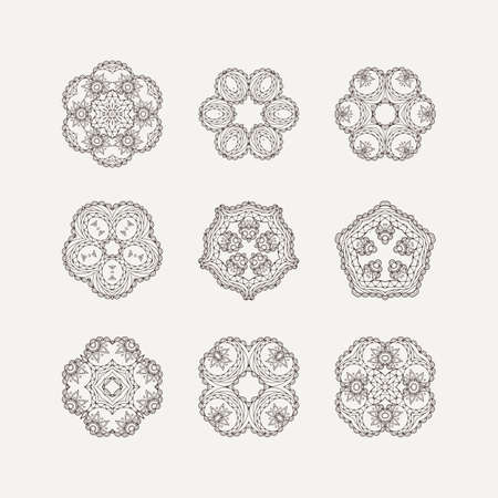 Set of ornate vector mandala symbols. Mehndi lace tattoo. Oriental weave. The circular pattern.のイラスト素材