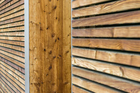 Texture of a modern wooden wall made of slats. oblique view.の写真素材