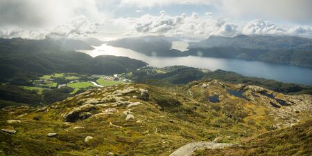 View from Hellandsnuten Mountain to town of Sand and five Fjords. Sandsfjord, Hylsfjord, Saudafjord, Vindafjord and Lovrafjord. Norway.の写真素材