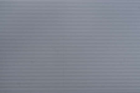 Blue metallic paper Background with horizontal rows and linesの写真素材
