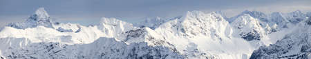 Amazing Winter Panorama with the snow covered Mountains Hochvogel, Hofats, Krottenkopf in Allgau Alps, Bavaria, Germany.の写真素材