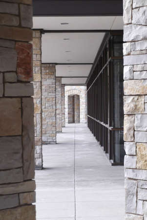 Architectural walkway with brick pillars